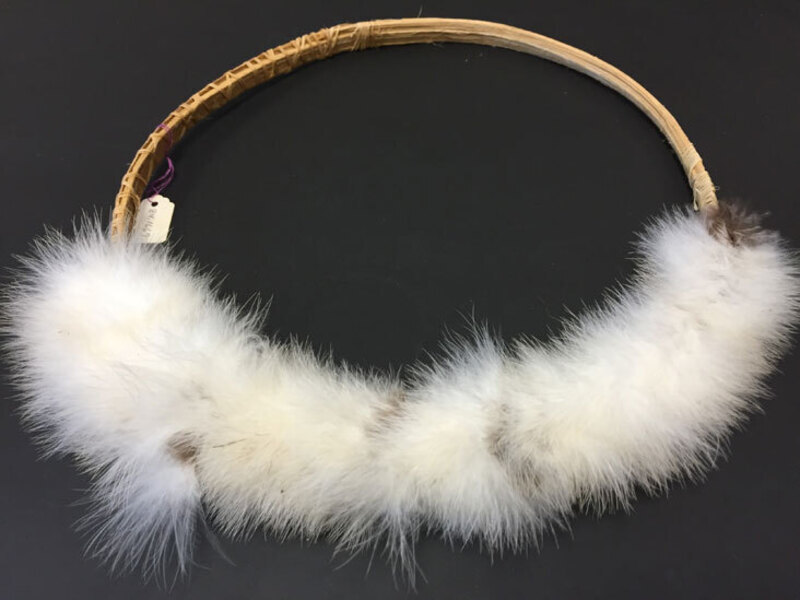 Headdress with white feathers (also called a crown). Part of a small collection of Waorani artifacts that Rachel Saint gave to the Billy Graham Center Museum in 1984, which were transferred to Wheaton Archives & Special Collections in 2015.