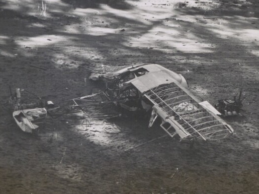 U. S. Army photograph of Nate Saint's destroyed plane. Original USCARIB Central caption reads: "Stripped and deserted is this monument to the five Missionaries who were murdered by fierce Auca Indians of Ecuador January 8. The five men were killed near the small wrecked plane on the Curaray River, after months of supposedly friendly relations and gift exchanging with the Indians. A joint Army, Navy, and Air Force search operation discovered the lance-pierced bodies of the missionaries after a short search in a U.S. Army H-13 Helicopter airlifted to Ecuador from the Canal Zone by Air Force and Navy C-47 type planes."