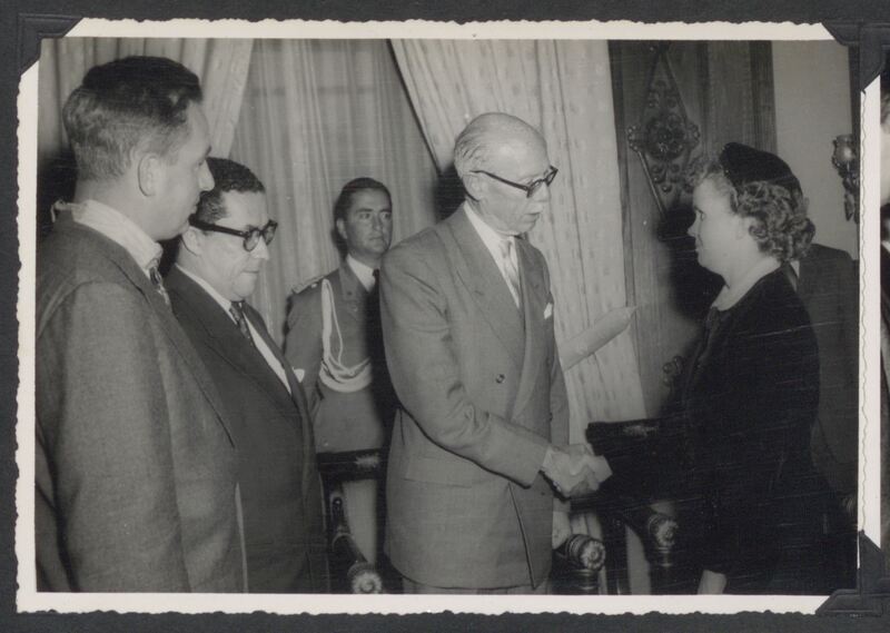 The President of Ecuador honored Abe Van Der Puy and HCJB for their role in coordinating communication in the remote Amazon during the search for the five missionaries. The five widows were also presented with a scroll. Left to right: Abe Van Der Puy, wearing the medal of honor, Doctor Rafael Arziga Vega, Minister of Foreign Relations, Mayor Vincente Serrano, Military Aid, President José María Velasco Ibarra, Marjorie Saint. 