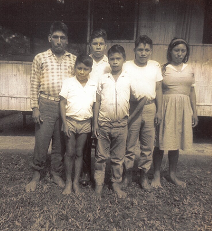 Black and white photograph of Mincaye (on far left) with unidentified group in western dress.