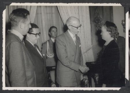 The President of Ecuador honored Abe Van Der Puy and HCJB for their role in coordinating communication in the remote Amazon during the search for the five missionaries. The five widows were also presented with a scroll. Left to right: Abe Van Der Puy, wearing the medal of honor, Doctor Rafael Arziga Vega, Minister of Foreign Relations, Mayor Vincente Serrano, Military Aid, President José María Velasco Ibarra, Marjorie Saint. 